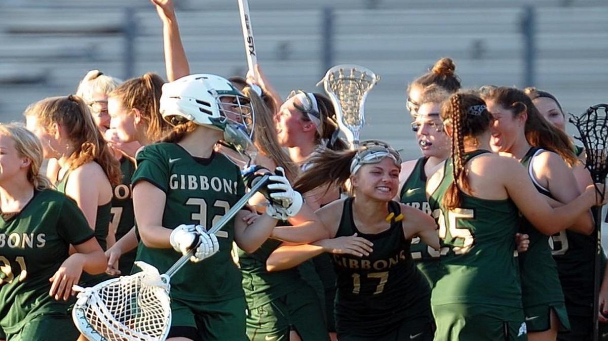 Cardinal Gibbons celebrates the win over Broughton after the girls lacrosse game, which was played in Raleigh on Tuesday, May 16, 2017. Cardinal Gibbons won 20-3.