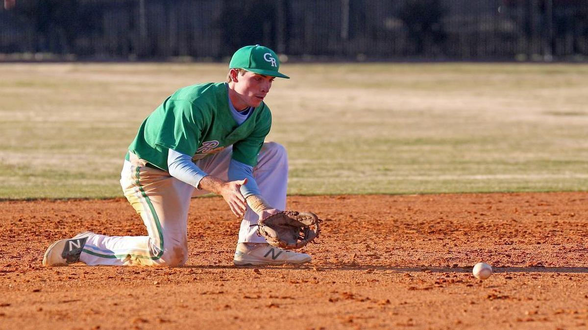 J.H. Rose shortstop Gregory Hardison (8) fields the baseball during the J.H. Rose High School boy's baseball game against D.H. Conley High School in Greenville, N.C. on Thursday, March 16, 2017.