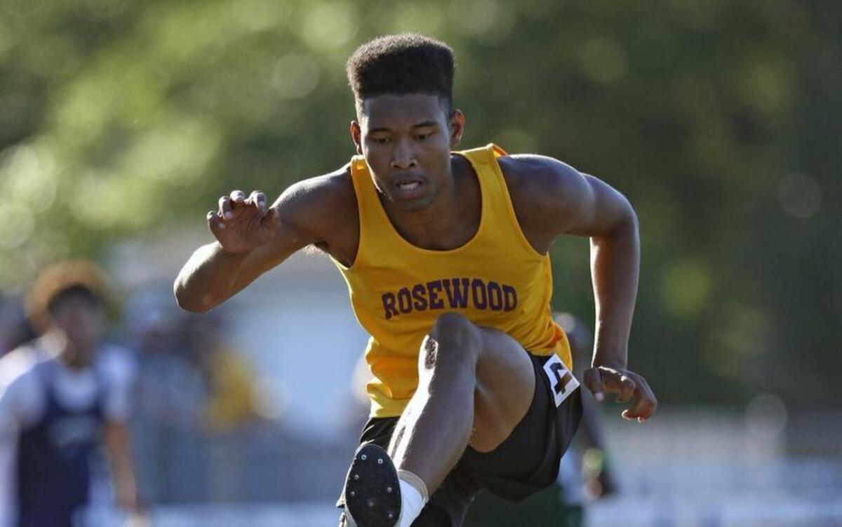 Rosewood's Alex Godwin clears the final hurdle on his way to the Boys 300 Meter Hurdle championship. Coverage from Carolina 1A Conference Track and Field championships held in Princeton, N.C. on Wednesday, May 3, 2017. The Hobbton High girls and the Rosewood High boys won conference championships.