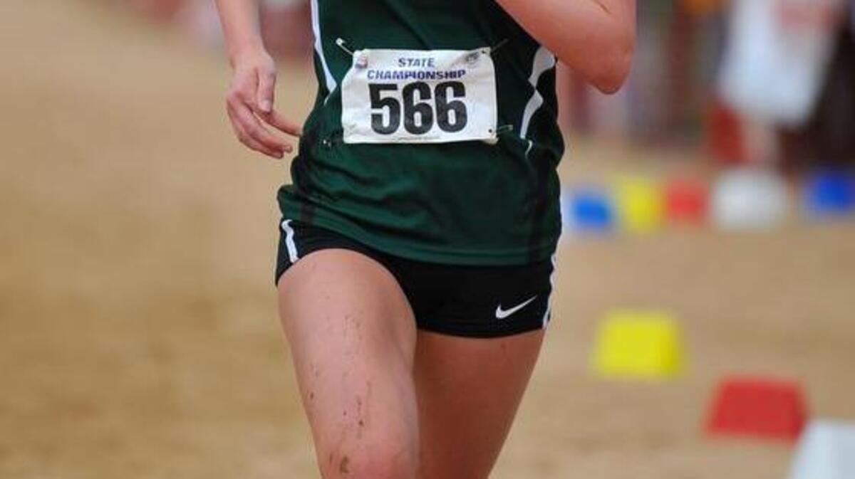 
Green Hope’s Elly Henes (566) wins The NCHSAA 4A girl's Cross Country Championship with a time of 18:02.47. . November 1, 2014, Kernersville, N.C. Green Hope wins the girls Championship with 45 points. November 1, 2014, Kernersville, N.C.
