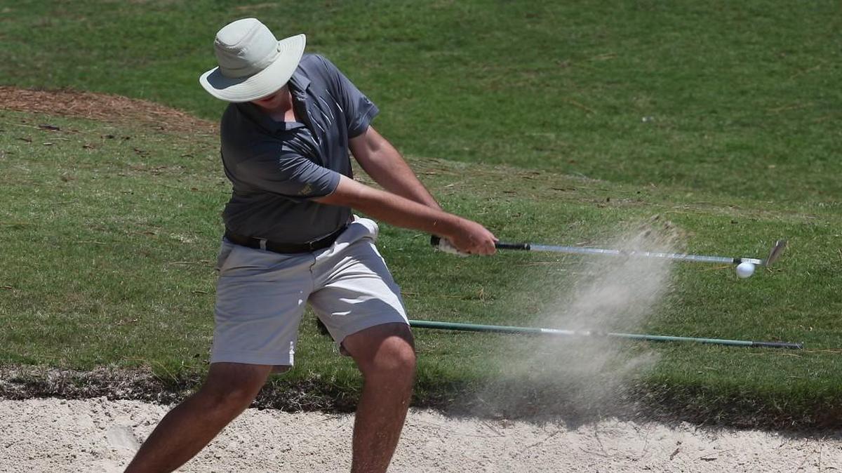 Saint David's School’s Andrew Wilmoth blast out of the sand trap during the NCISAA 2A championships at the Mid South Golf Club at in Pinehurst, N.C. on May 15, 2017.
