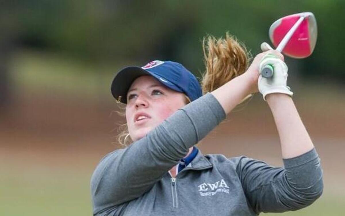 Caitlyn Seastrunk of East Wake Academy hits a drive during day one of the 2015 NCHSAA 1A/2A girls golf championships at Longleaf Golf & Country Club in Southern Pines, N.C. on Monday, Oct. 26.