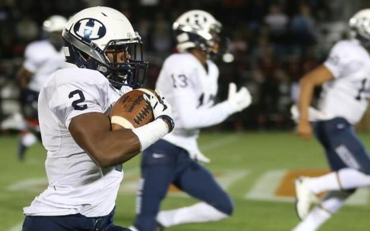 Hillside's Abdul Adams (2) runs down the sideline for an apparent score on the Hornets second play from scrimmage but is called back on a holding penalty on Friday, Nov. 27, 2015. He was named PAC-6 offensive back of the year.