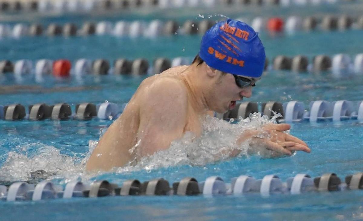 Zach Brown of Athens Drive swims in the Men 200 Yard Individual Medley race during the NCHSAA 4A Swimming Championships that took place at the Triangle Aquatic Center in Cary, N.C. on Saturday, February 10, 2018.