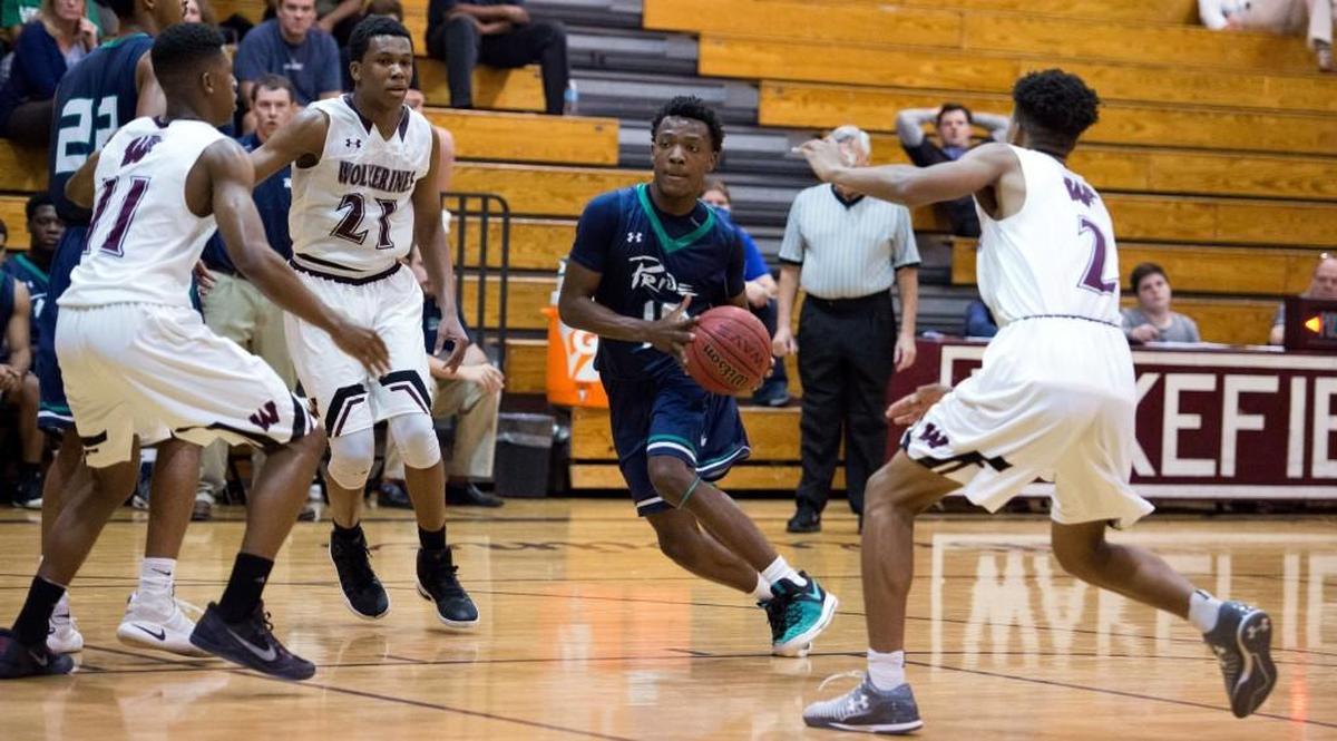 Leesville’s D.J. Horne (10) drives hard to the basket during Cap-8 matchup between Leesville Road and Wakefield that took place at Wakefield High School on January 13, 2017 in Raleigh, North Carolina. Leesville Road girls win in a thriller against Wakefield by the score of 47-45. Leesville Road boys dominate Wakefield boys by the score of 85-68.