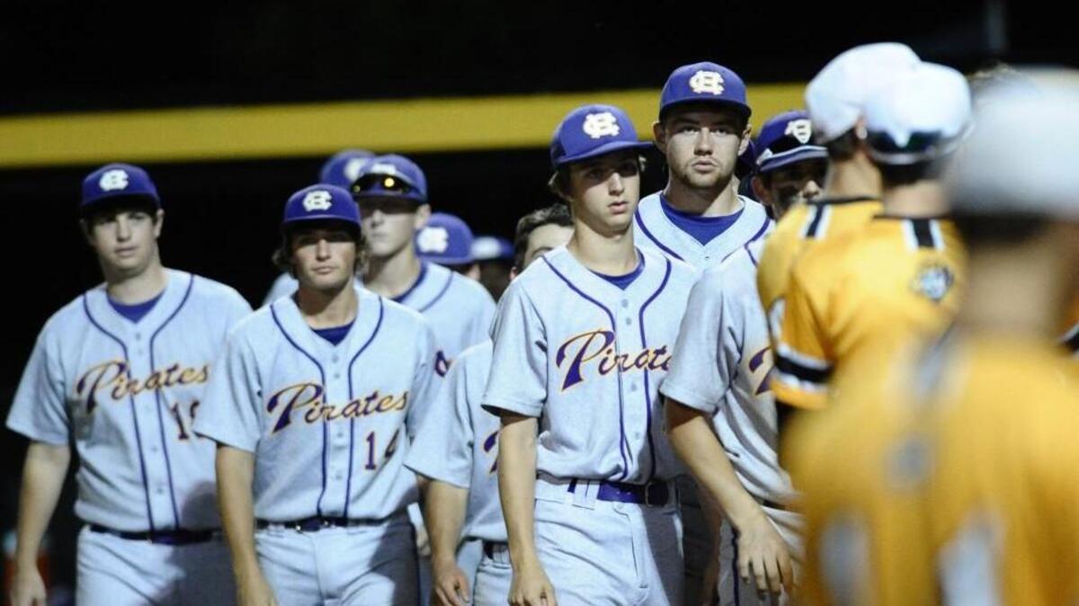 Corinth Holders players ponder what could have been in the post-game handshake line after a 7-0 loss to Topsail in Game 1 of the Eastern Regional Championship Series on Tuesday. The seven runs scored by Topsail in the first inning were the game’s only runs.