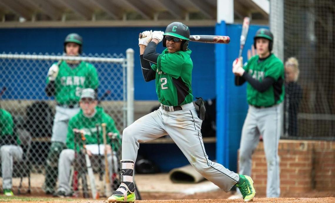 Cary's Greg Jones (2) swings at a pitch during a high school baseball game against Athens Drive in Raleigh, N.C. on Friday, Mar. 17, 2017.