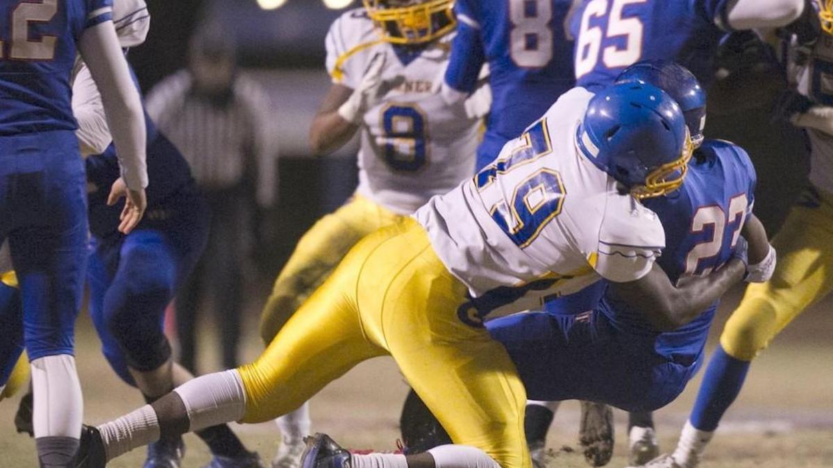 Garner’s Matthew Butler makes a play against Wake Forest’s Dajuan Green in 2015. Butler will play in Saturday’s Shrine Bowl.