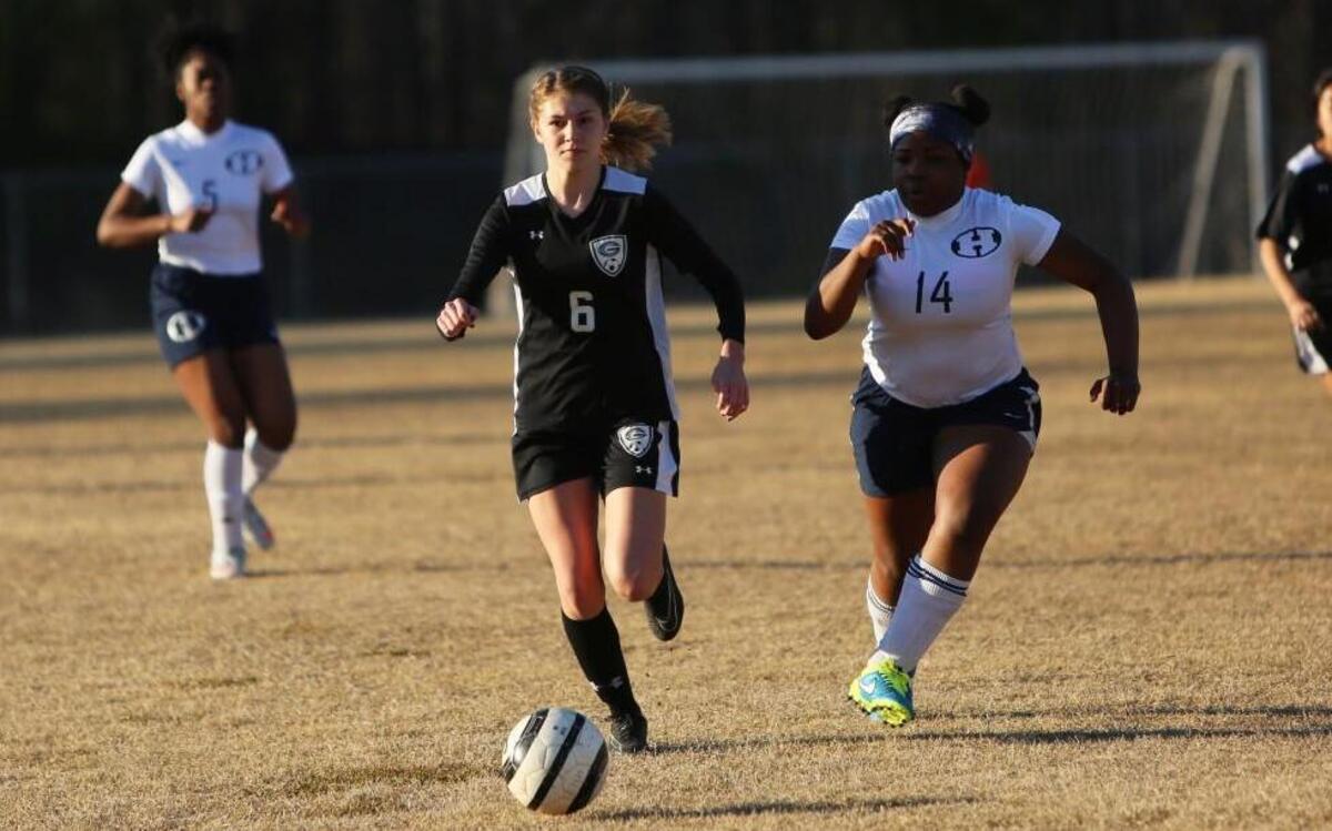 Granville Central's Kathleen Burroughs (6) sprints down the field during the Granville Central girl's soccer team's 1-0 win over the Hillside Hornets at Hillside High School in Durham, N.C., Tuesday, March 23, 2017.