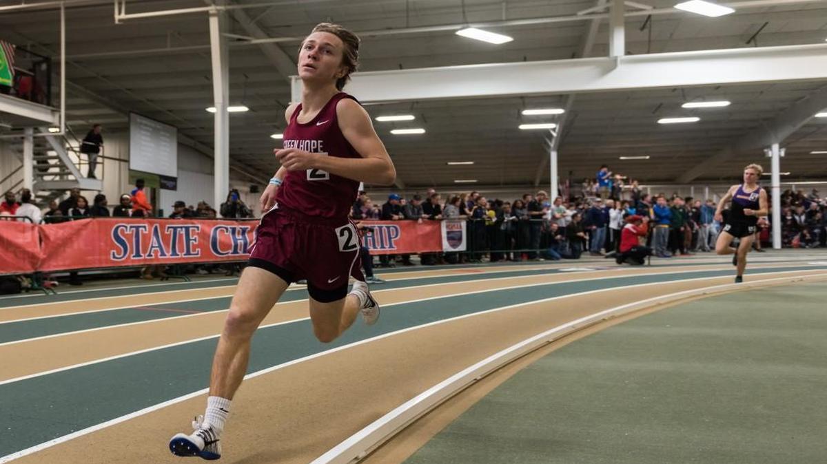 Green Hope High School senior Henry Pehr competes in the boys 1600 meter run during the 2016 NCHSAA 4A Indoor State Track Meet at JDL Indoor Fast Track in Winston-Salem on Saturday, February 13. Green Hope’s state championship in Indoor Track helped the Falcons secure a Wells Fargo Cup for the seventh straight year.