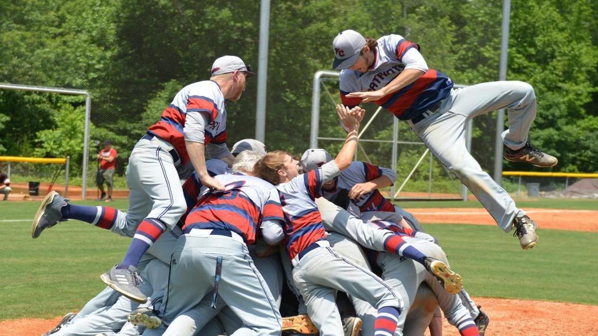 Faith Christian players celebrate after winning the NCISAA State 2A baseball championship. The Faith Christian Patriots played Northside Christian Knights in the NCISAA State 2A baseball championship that took place on Saturday May 20, 2017 in High Point, NC. Faith Christian won 5-4.