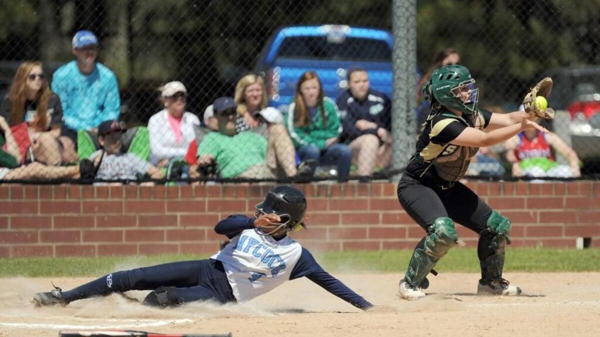 C.B. Aycock's Connor Vinson (1) slides safely into home ahead of the throw to South Johnston's Mack Honeycutt during the Harnett Central Easter Tournament game, which was played on Wednesday, March 30, 2016 in Harnett County. Aycock beat South Johnston 7-6 in the championship game.