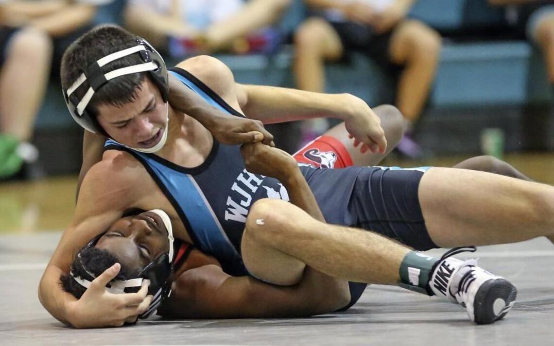West Johnston wrestling downs Rolesville, clinches at least GNRC share