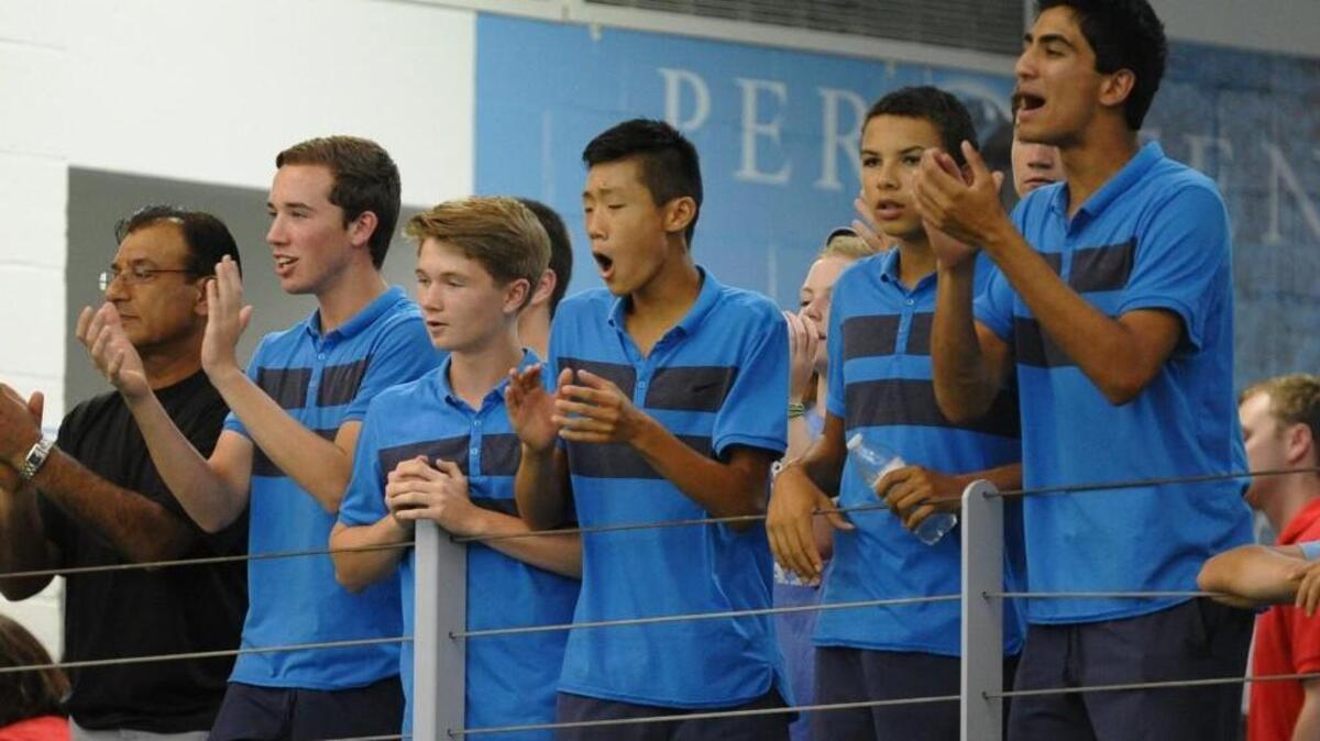 Members of the Panther Creek tennis team cheered on their own during the NCHSAA 4A boys tennis championship match against Page, which was held in Chapel Hill on Saturday, May 21, 2016.