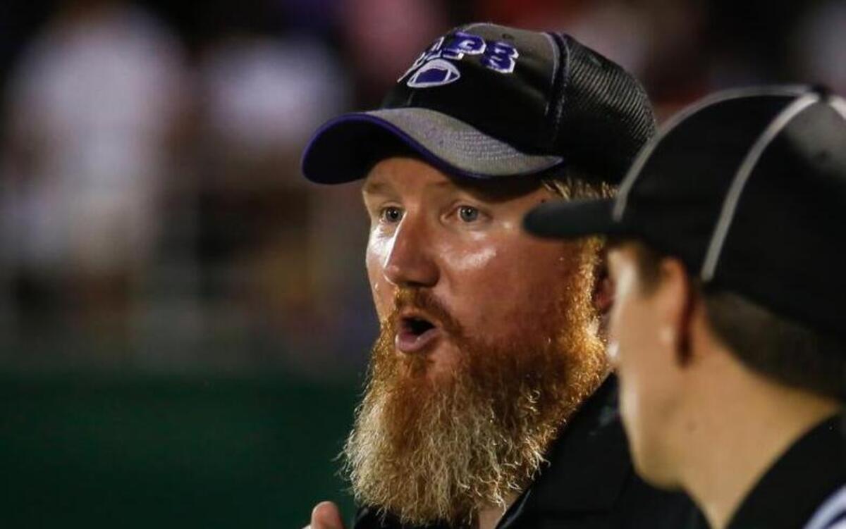 Broughton head coach Billy Lane during Broughton's football game at Cary on Friday, August 28, 2015.