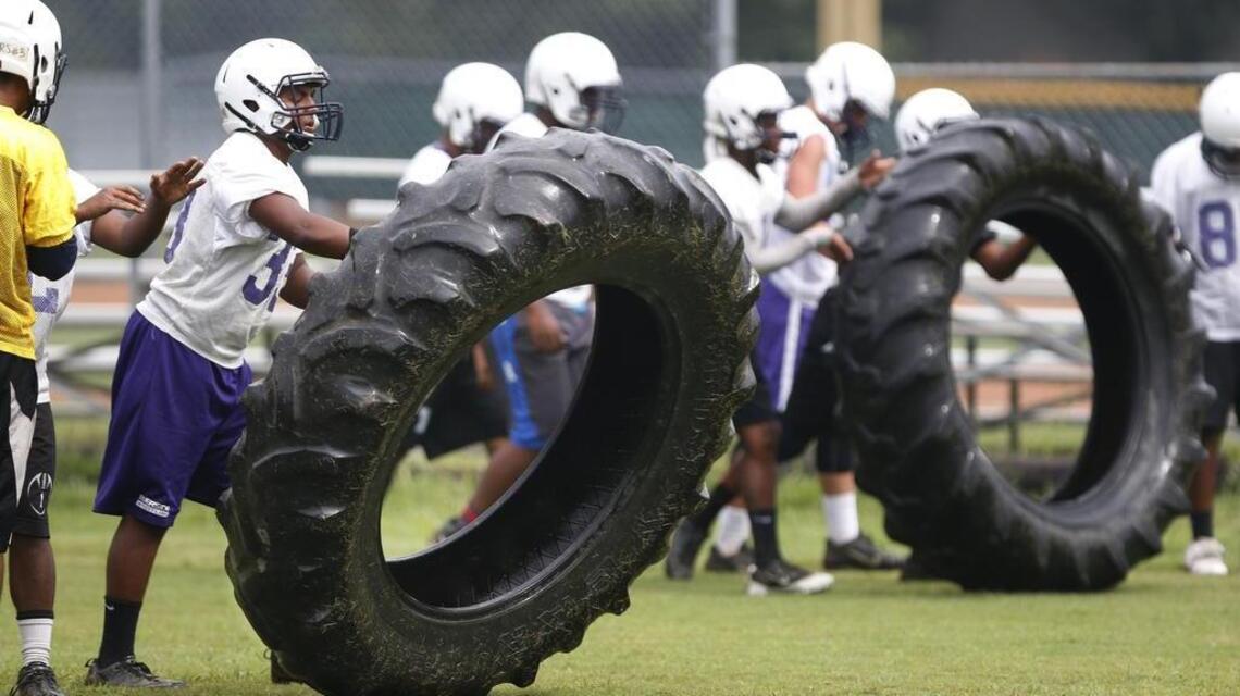 As high school football practices begin, heat managed differently than before