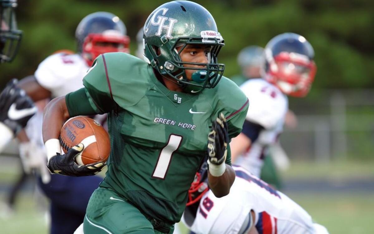 Green Hope's Blake Watson (1) scores a touchdown during the football game against Jordan, which was played in Cary on Friday, August 26, 2016.