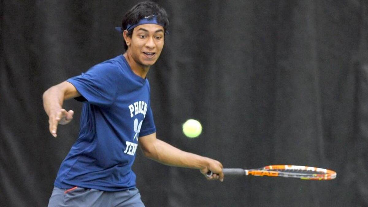Raleigh Charter’s Revant Birla returns the serve of Pine Lake's Daniel Crossin during the NCHSAA 1A boys tennis championship match, which was held in Chapel Hill on Saturday, May 21, 2016. Raleigh Charter won 5-3.