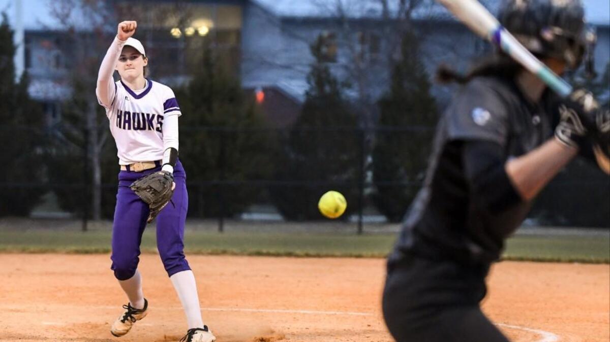 Holly Springs pitcher Alyssa Brown (7) goes for strike during Panther Creek's softball game against Holly Springs that took place on Friday, March 17, 2017 in Holly Springs, N.C. Holly Springs won 11 to 6.
