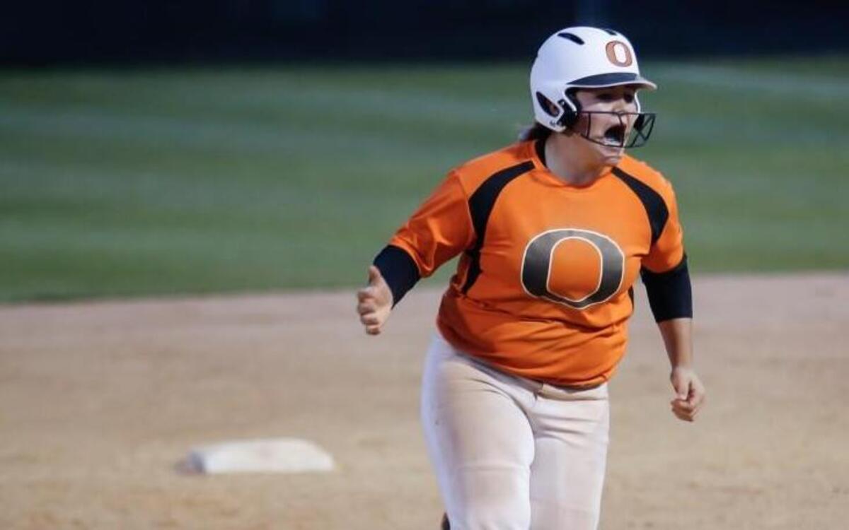 Orange's Mia Davidson (33) screams in celebration as she rounds the bases after a homerun during Northwood's softball game at Orange on April 15. Orange won the game 5-4 in 9 innings.
