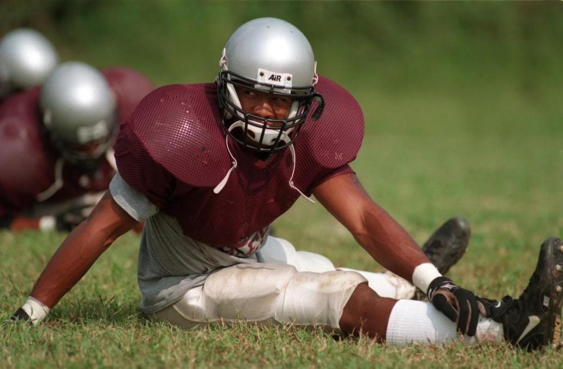 NC Central defensive back Buddy Crutchfield stretches before Tues. pm practice.