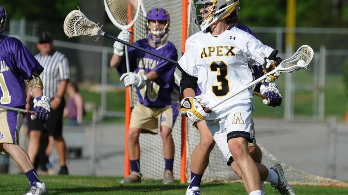 Apex's Jack Hayden (3) sets up a play during the NCHSAA second round of the boys lacrosse 4A playoff game between the Broughton Capitals and the Apex Cougars in Apex on Friday, May 8, 2015. Apex won 12-5.
