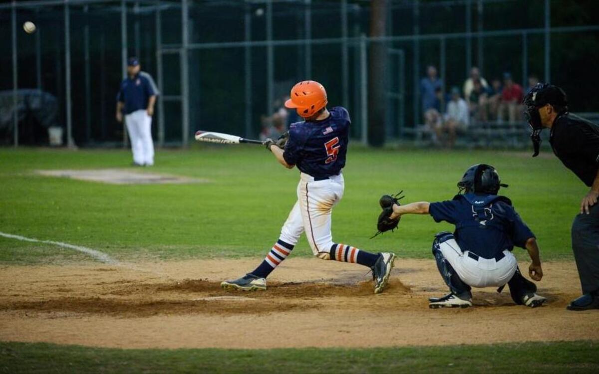 Southern Lee's Hayden Cross (5) gets a hit during game with Lee County. The Lee County Yellow Jackets took on the Southern Lee Cavaliers in a regular season CFVC baseball game in Sanford, N.C. on April 21, 2017. Southern Lee won 5-1.
