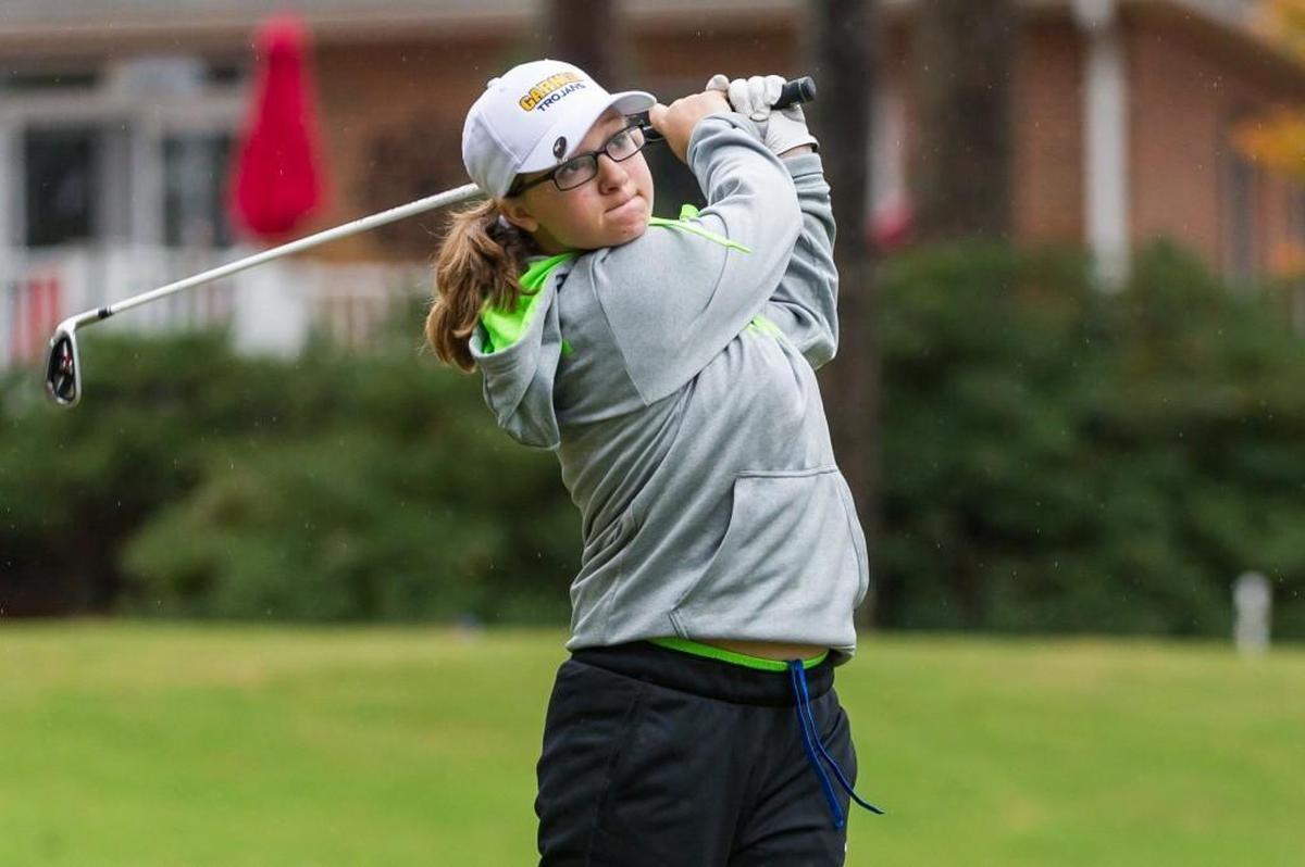 Kayla Ward of Garner High School hits a tee shot during the 2015 NCHSAA 4A Women's Golf Championships at Pinehurst No. 6 in Pinehurst, NC on Tuesday, October 27.