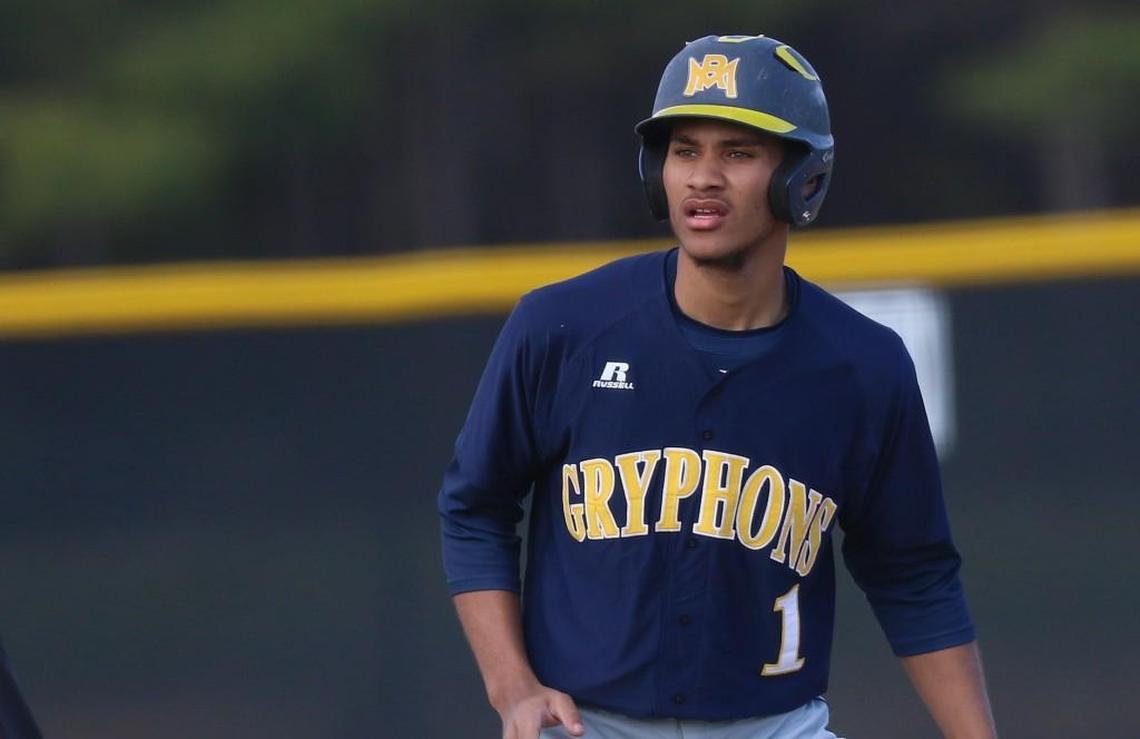 Rocky Mount's David Harrison (1) steps off the bag in a game against Cleveland.