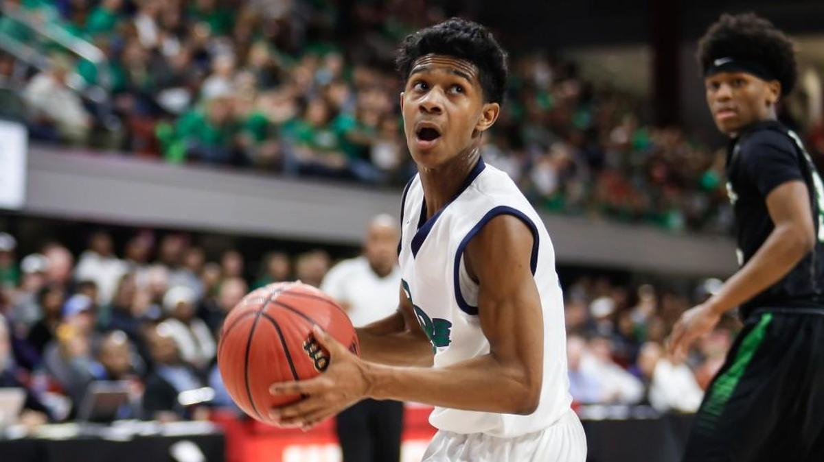 Leesville Road's Jalen Benjamin turns toward the basket with the ball during the NCHSAA 4A Boys Basketball State Championship game between Leesville Road and Southwest Guildford in Raleigh on Saturday, March 11, 2017.
