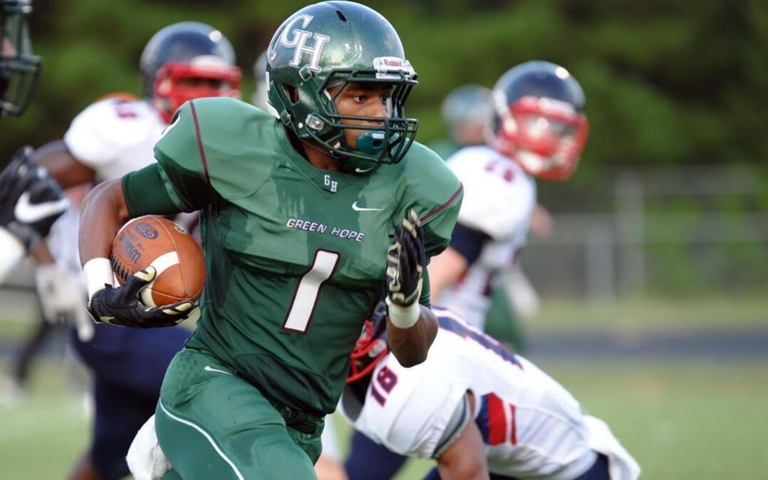Green Hope's Blake Watson (1) scores a touchdown during the football game against Jordan, which was played in Cary on Friday, August 26, 2016.