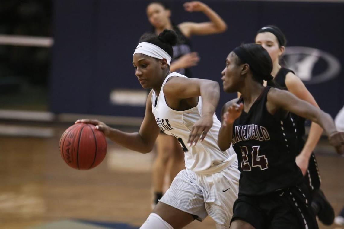 Heritage's Cydney Johnson (5) pushes the pace as she dribbles upcourt. The Heritage Huskies and Wakefield Wolverines girls and Heritage Huskies and Knightdale Knights boys played in the NAC6 4A Conference basketball tournament championships on Feb. 16, 2018.