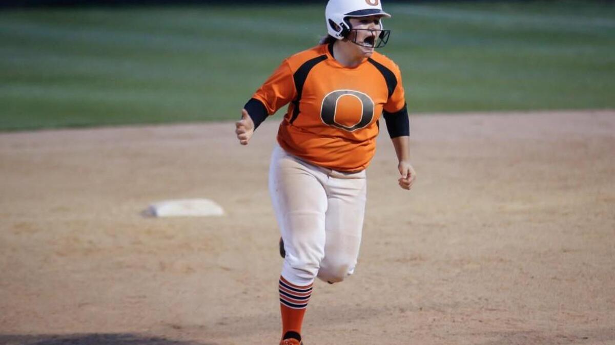 Orange's Mia Davidson (33) screams in celebration as she rounds the bases after a homerun during Northwood's softball game at Orange on Friday, April 15, 2016. Orange won the game 5-4 in 9 innings.