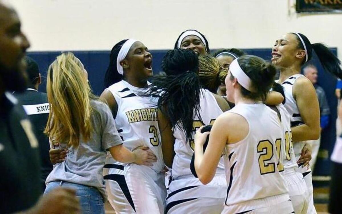 Knightdale players celebrate after their win over Greater Neuse River 4A Conference rival East Wake at Knightdale High School in Knightdale, N.C. Friday, Jan. 15, 2016.
