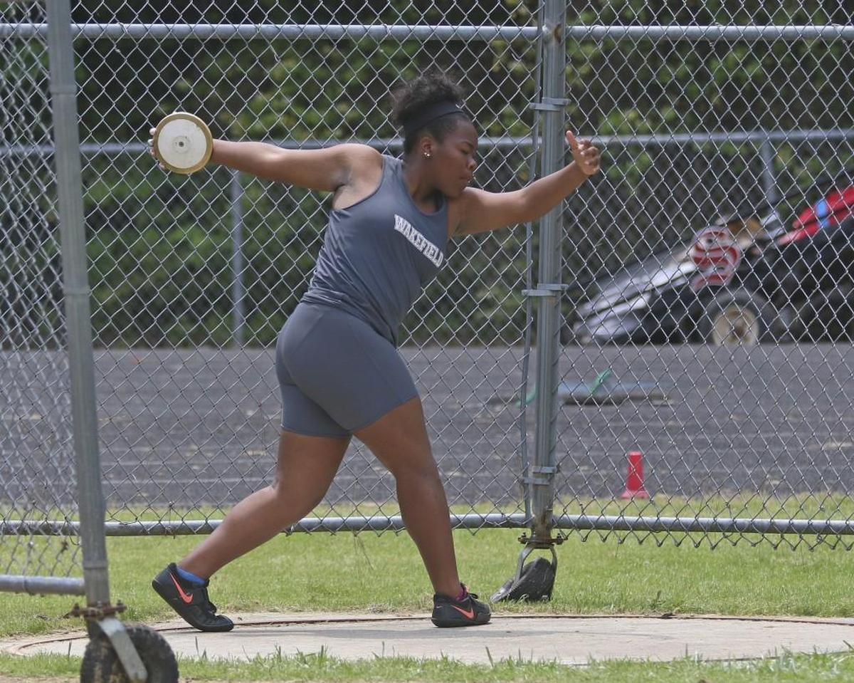 Wakefield's Veronica Fraley wins both the girls discus and shot put Cap-8-8 championships.