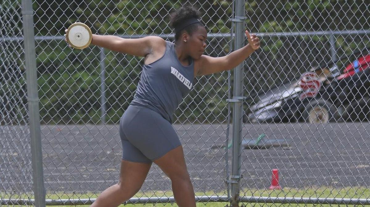 Wakefield's Veronica Fraley wins both the girls discus and shot put Cap-8-8 championships.
