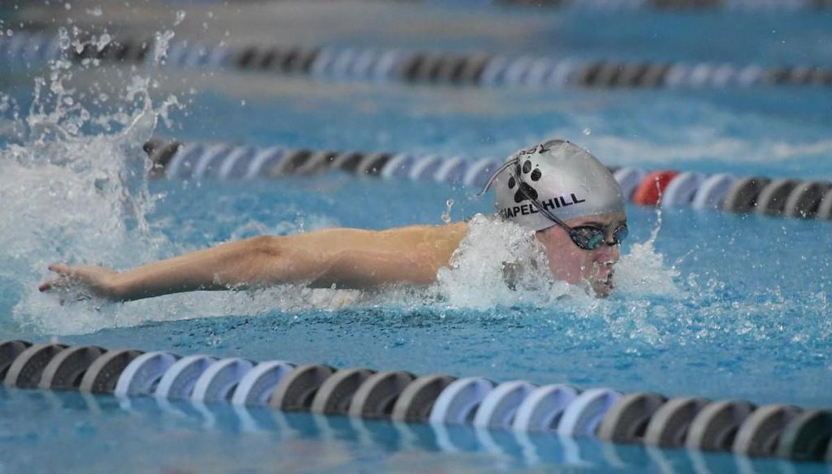 Sophie Perez of East Chapel Hill swims in the Women 100 Yard Butterfly race during the NCHSAA 3A Swimming Championships that took place at the Triangle Aquatic Center in Cary, N.C. on Thursday, February 8, 2018.