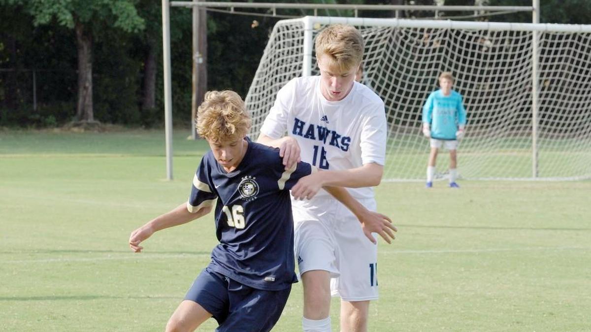 Charlotte Latin’s Connor Fultz (right) helped his team to a first round N.C. Independent Schools’ state playoff soccer win Tuesday