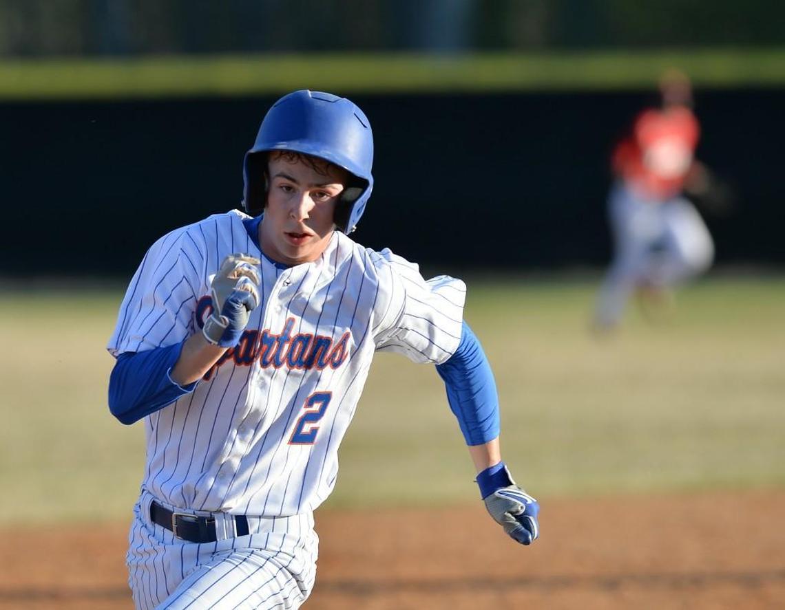 Jabe Montgomery (2) of Kerr-Vance Academy runs to the third base. The J.F. Webb Warriors played the Kerr-Vance Academy Spartans in a baseball game that took place in Oxford, N.C. on Tuesday, March 29, 2016. Kerr-Vance Academy won 5-2.