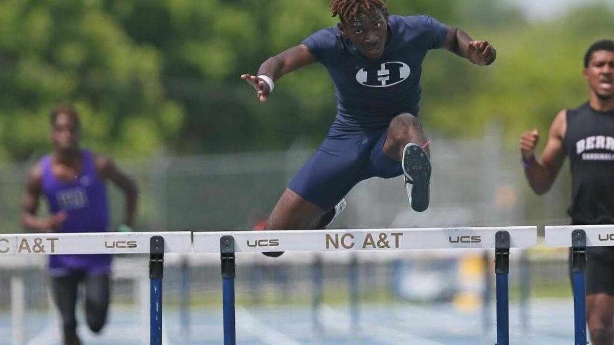 Hillside High’s McLinly Brown crosses the finish line on his way to the state title in the Boys 300 Meter Hurdles. The 4A Track and Field Championships were held in North Carolina A&T’s Irwin Belk Track on Saturday, May 9, 2015.