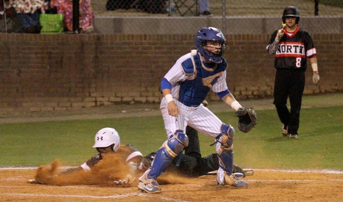 Hunt's Bryson Worrell gets ready to field a throw to home during the North Johnston High School boy's baseball game against Hunt High School in Wilson, N.C. on Monday, March 6, 2017.