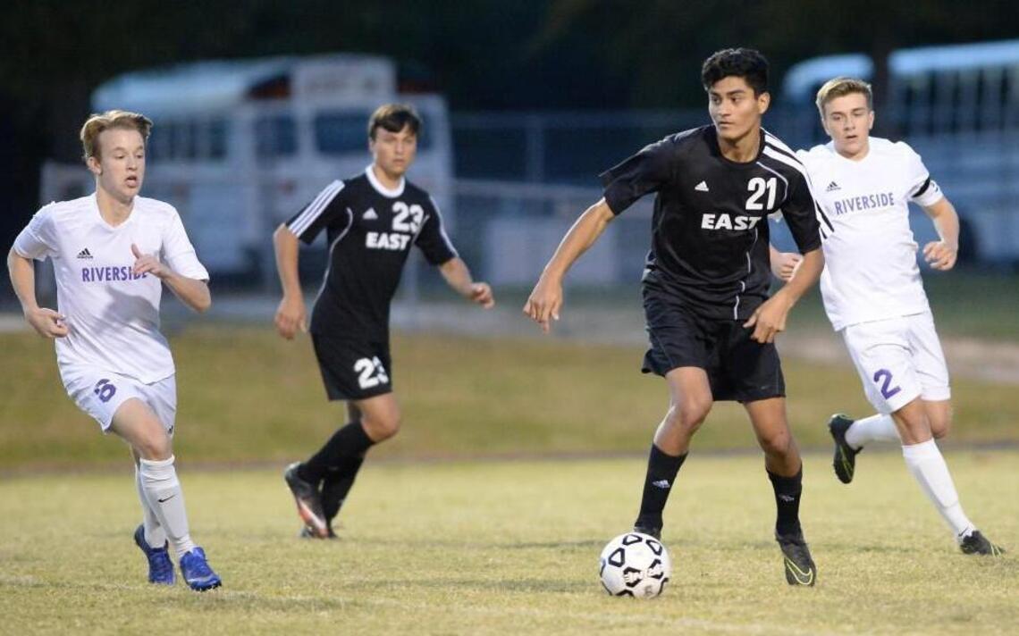 East Chapel Hill boys soccer boosts playoff outlook with win at Riverside