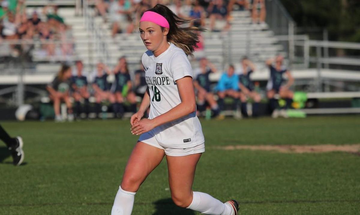 Green Hope's Bailey Petersen (18) dribbles the ball during the Leesville Road high school soccer match with Green Hope high school in the third round of the state high school playoffs at Cary N.C. on May 16, 2017. Green Hope won 5-0.