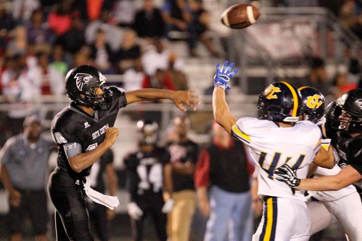 South Central's Dexter McDuffie (10) with the pass attempt. The D.H. Conley Vikings visited the South Central Falcons in a high school football game on Nov. 3, 2017