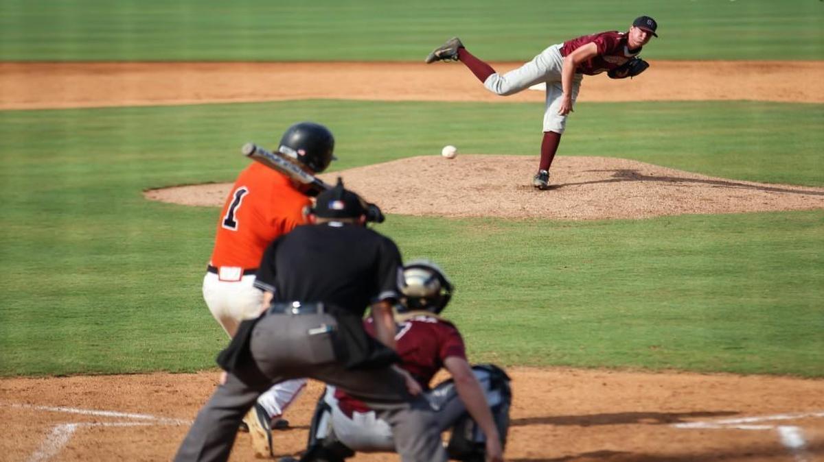 Green Hope's Mitch Spence (24) pitches to North Davidson's Joe Butts (1) during the NCHSAA 4A State Championship baseball game between Green Hope and North Davidson in Zebulon on Friday, June 3, 2016. North Davidson won the game 6-0, the first in a best-of-three series.