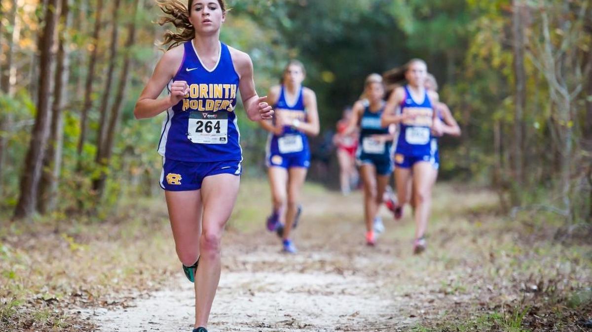Corinth Holders’ Kayla Ste, Marie running on the trail during the Two Rivers 3A Conference at Smithfield Selma Community Park in Smithfield Selma, N.C. on Wednesday, October 21, 2015. Cleveland Boys and Corinth Holders Girls won.