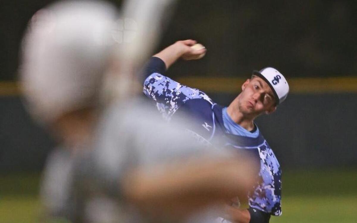 South Granville's Justin Bullock (12) strikes out the frame in the top of the seventh to get the shutout. Coverage from the Bobby Murray Invitational Baseball Tournament championship game between the South Granville Vikings and the Northwood Chargers played in Raleigh, N.C, on Saturday, April 2, 2016. South Granville defeated Northwood 3-0 to win the championship. Millbrook defeated Southwest Guilford 11-4 to win the consolation game.