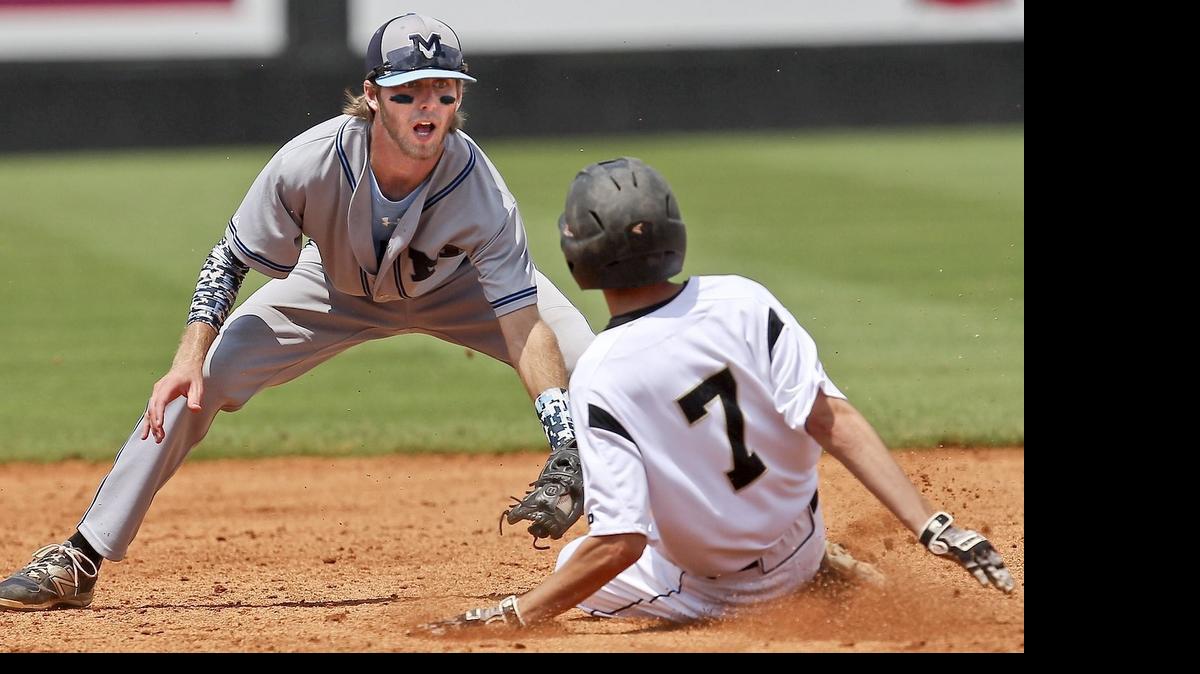 
Millbrook's Joseph Ward (3) puts the tag on Providence's Satchel Jerzembeck (7) at second during the NCSHAA 4A Championship baseball game played at Five County Stadium with Millbrook High School and Providence High School baseball game , June 6, 2015 in Zebulon, NC. Providence won 10-0.
