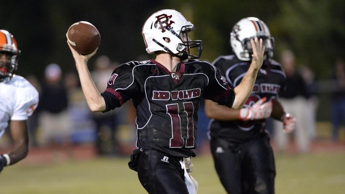 Cedar Ridge quarterback Philip Berger (11) throws a pass. The Cedar Ridge Red Wolves played the Orange Panthers in a football game that took place in Hillsborough, N.C., on Oct. 14, 2016. Orange won 42-3.