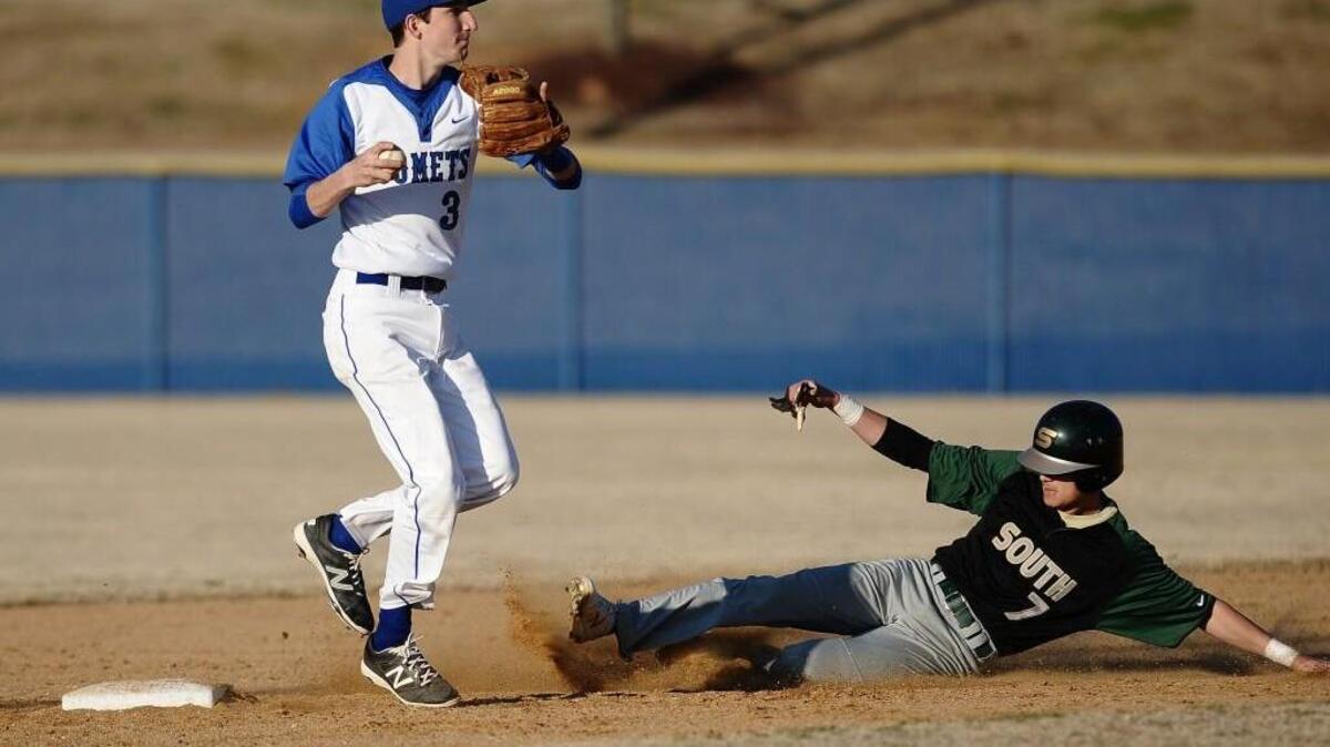 Clayton’s Jon Messina (3) gets ready to put the tag on South Johnston’s Zachary McLamb (7) at second base.